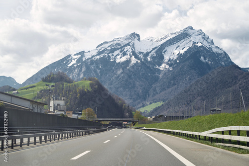Scenic Mountain Road Landscape. A Stunning Highway Journey through Colorful Nature in Europe. Nature landscape on a beautiful highway. car driving on the highway in spring. © AlexGo