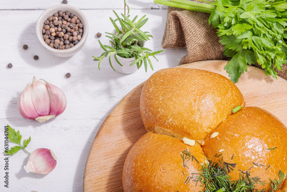 Aromatic garlic buns. Fresh baked goods, a traditional gluten-free soup snack. Parsley, spices