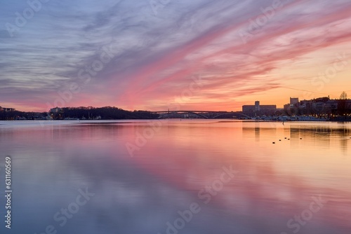 Idyllic scene of Stockholm cityscape on the shore at sunset in Sweden