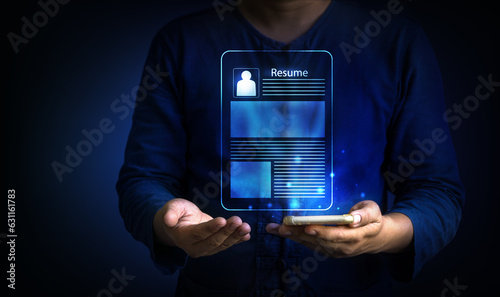 man holding resume virtual screen. job search and recruiment concept.  photo