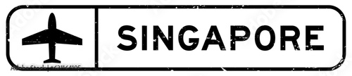 Grunge black singapore word with plane icon square rubber seal stamp on white background