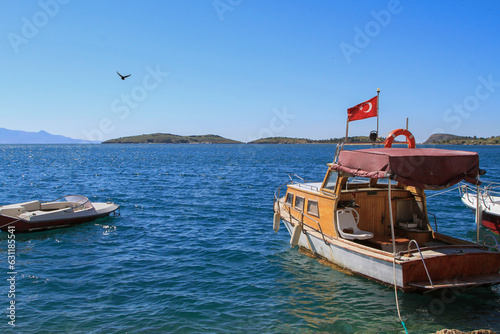 Fototapeta Naklejka Na Ścianę i Meble -  Historical Old Foça bay with its magnificent view, small boats. İzmir Turkey travel., Photos from Old Foça