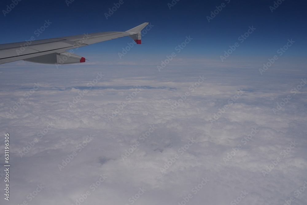 Fototapeta premium airplane in the sky, clouds