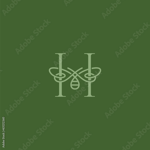luxury letter H and bee for beekeeping logo design