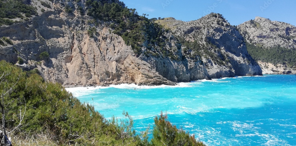 oastal Splendor: Rocky Cliffs and the Mesmerizing Midterrain Sea of Mallorca oastal Splendor: Rocky Cliffs and the Mesmerizing Midterrain Sea of Mallorca