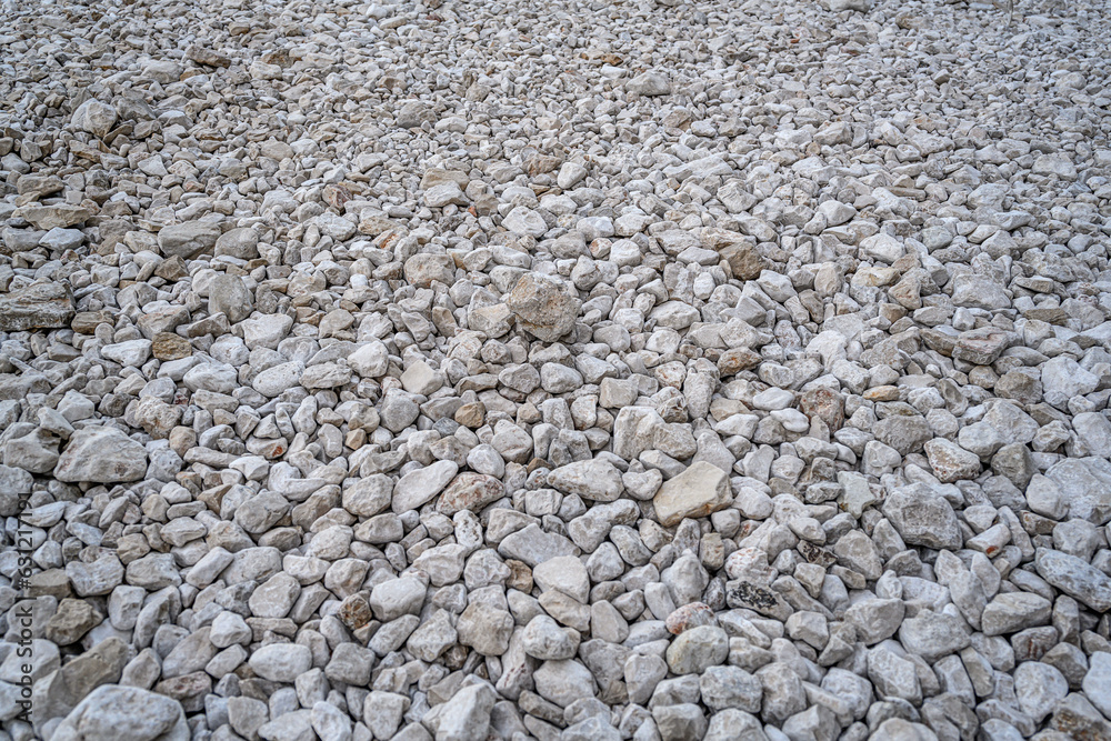 White pebbles on the beach as an abstract background. White pebbles on the beach as an abstract background.