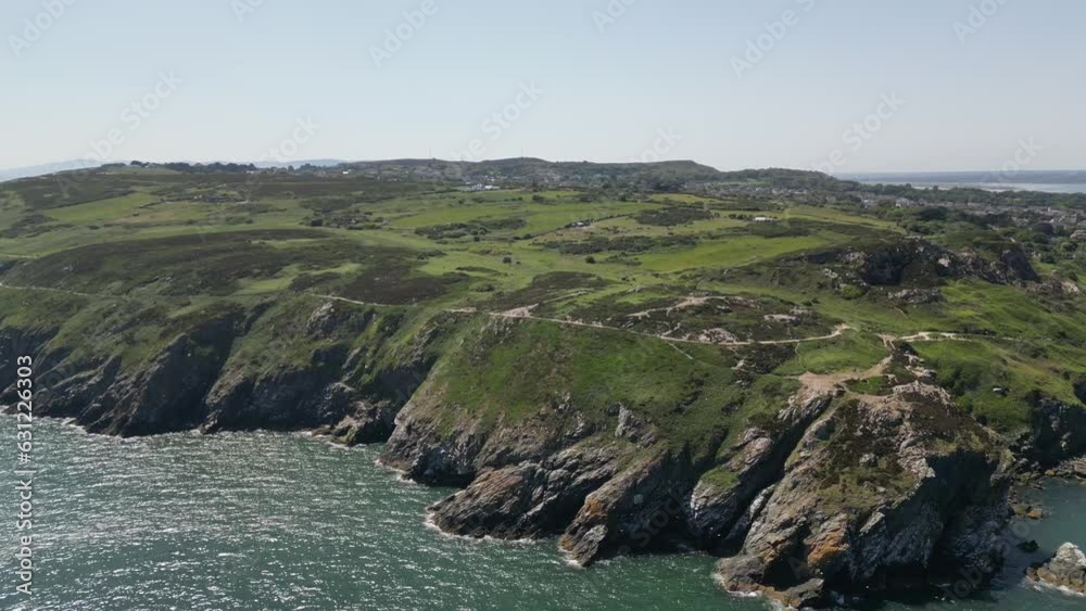 Drone view of a huge cliff by a sea Drone view of a huge cliff by a sea