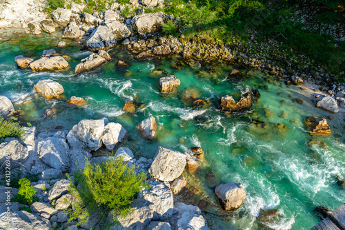 crystal clear turquoise Soca river in Slovenia near Kobarid and Bovec famous for sport activities rafting kayaking