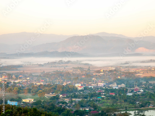 Natural viewpoint, mountains, hills, forests and river under morning mist in Chiangrai, Thailand © jeafish