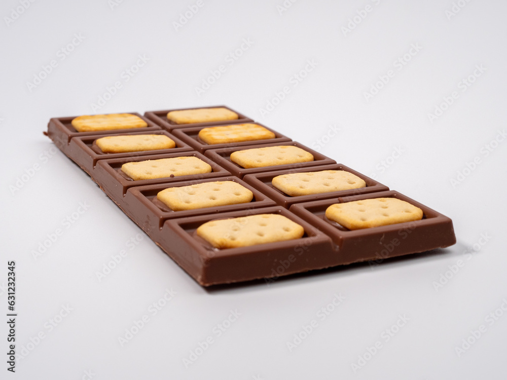 Chocolate with cookies on a white background. Chocolate bar. Chocolate with cookies on a white background. Chocolate bar.