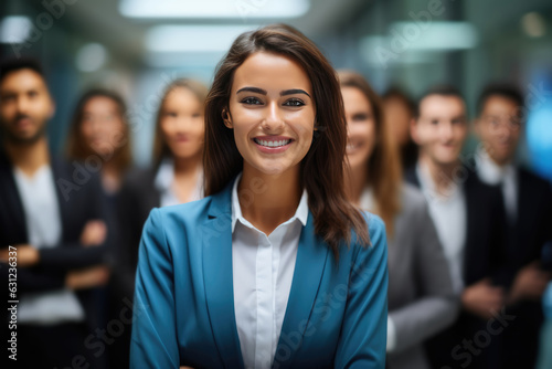Woman Standing In Front Of Group Of People photo