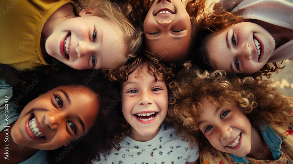 A group of happy schoolchildren gathered in a circle and look into the camera from below.Created with Generative AI technology. A group of happy schoolchildren gathered in a circle and look into the camera from below.Created with Generative AI technology.