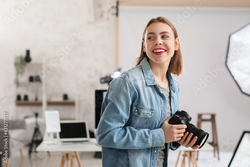 Female photographer with pr...