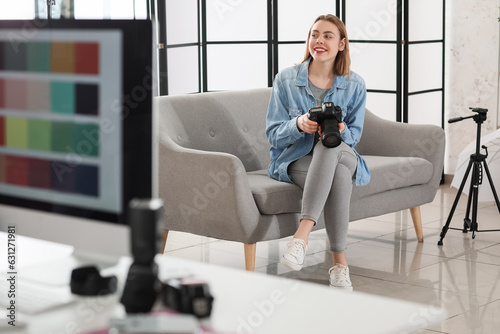 Female photographer with pr...