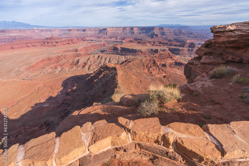 hiking the dead horse trail in dead horse point state park in utah, usa hiking the dead horse trail in dead horse point state park in utah, usa