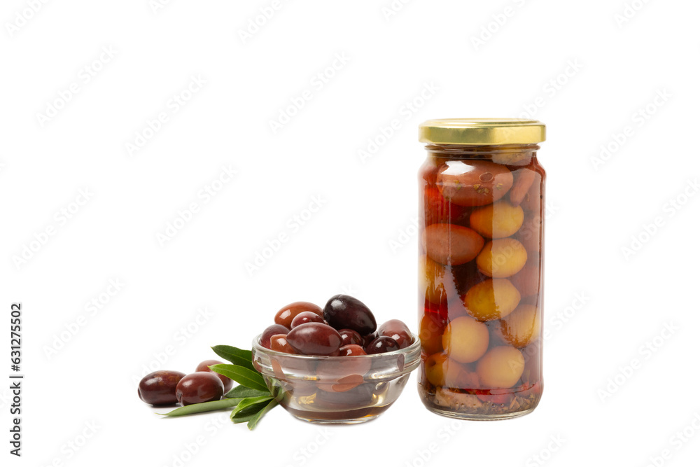 Delicious red olives in a jar isolated on white background. Pickled olives in a glass jar. Delicious olives. Close-up. Vegan. Delicious red olives in a jar isolated on white background. Pickled olives in a glass jar. Delicious olives. Close-up. Vegan.