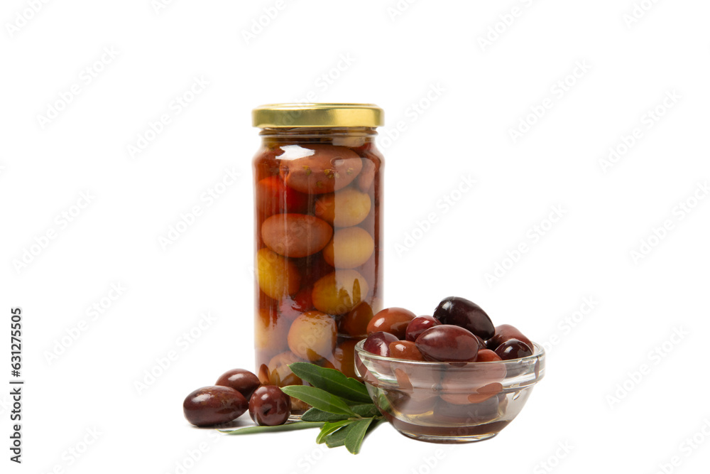 Delicious red olives in a jar isolated on white background. Pickled olives in a glass jar. Delicious olives. Close-up. Vegan. Delicious red olives in a jar isolated on white background. Pickled olives in a glass jar. Delicious olives. Close-up. Vegan.