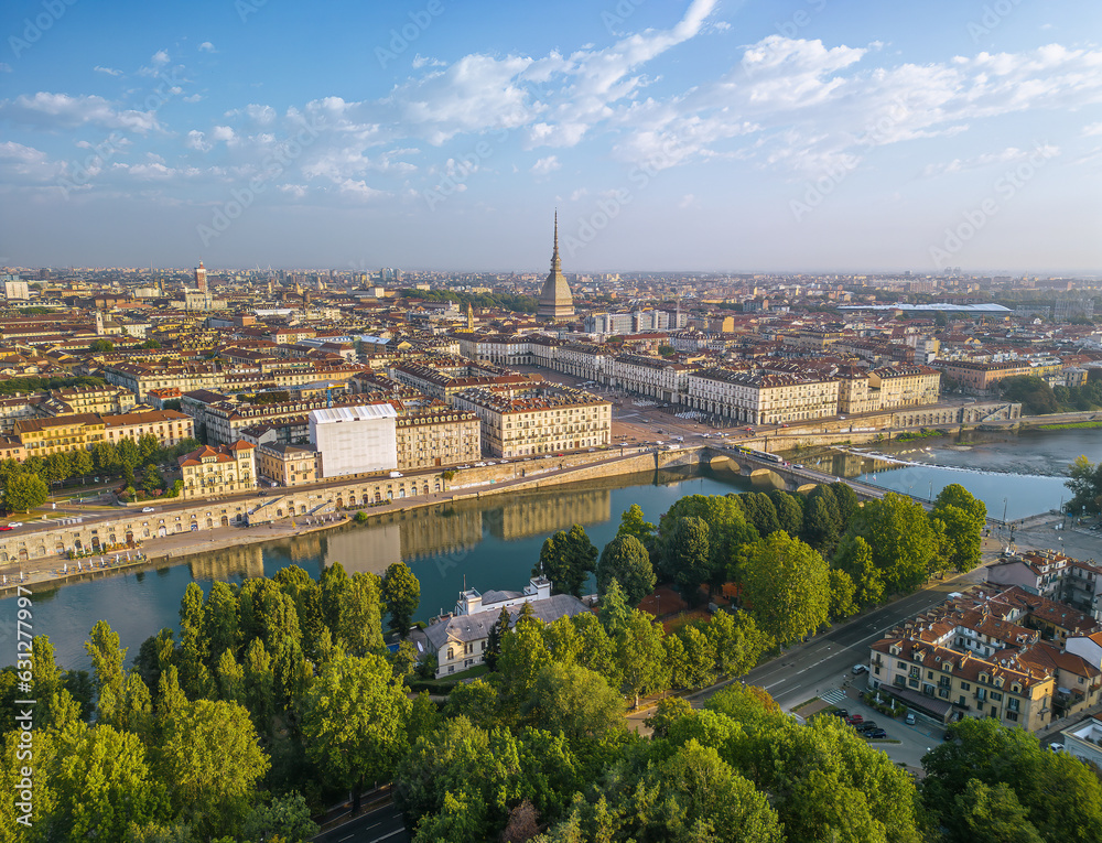 The drone aerial view of Turin city centre with Mole Antonelliana at sunrise, Piedmont region of Italy.