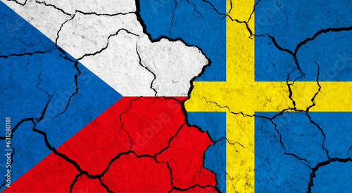 Flags of Czech Republic and Sweden on cracked surface - politics, relationship concept