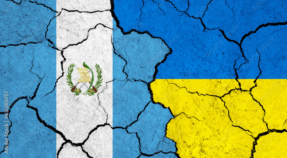 Flags of Guatemala and Ukraine on cracked surface - politics, relationship concept Flags of Guatemala and Ukraine on cracked surface - politics, relationship concept