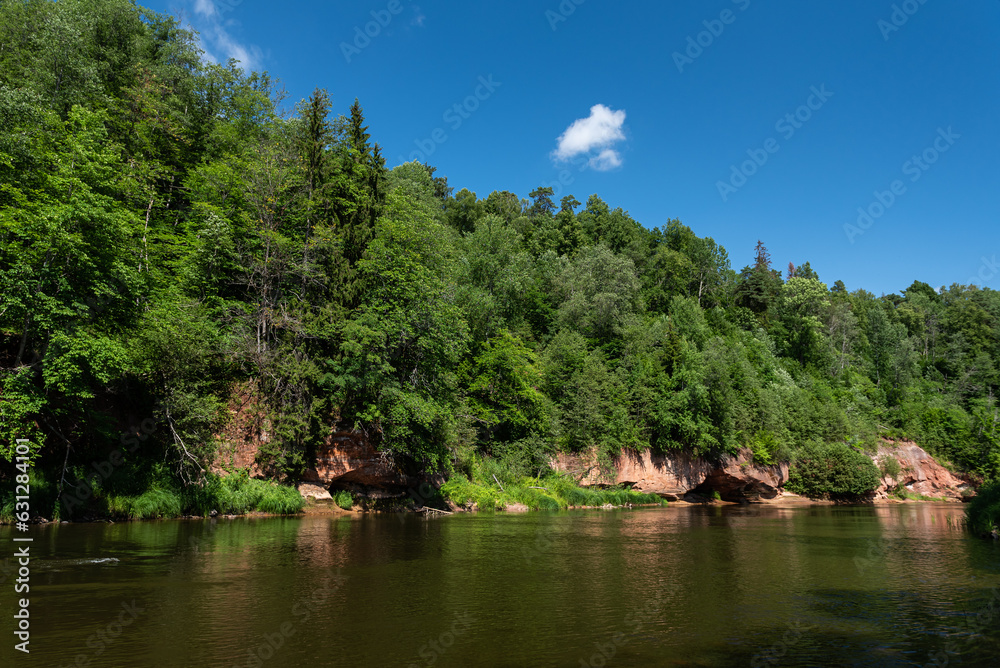 Obraz premium Sandstone Kuku cliffs by the river Gauja, Latvia.