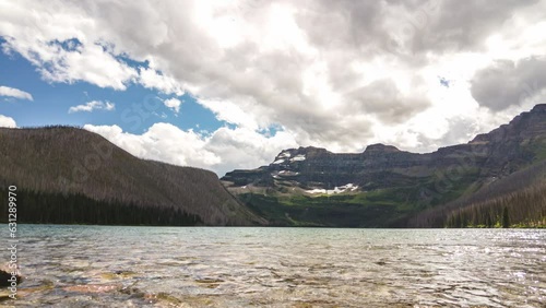 Cameron Lake timelapse with Mount Custer and Forum peak. Cameron Lake is a sub-alpine lake in Waterton Lakes National Park, Alberta, Canada photo