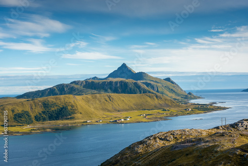 Beautiful landscape of the Lofoten Islands during the golden hour, view from Offersoy Mount trail, Norway