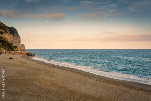 Fototapeta Naklejka Na Ścianę i Meble -  Sunset over Baia dei Saraceni (Saraceni Bay) Beach, Ligurian Sea,  Italy