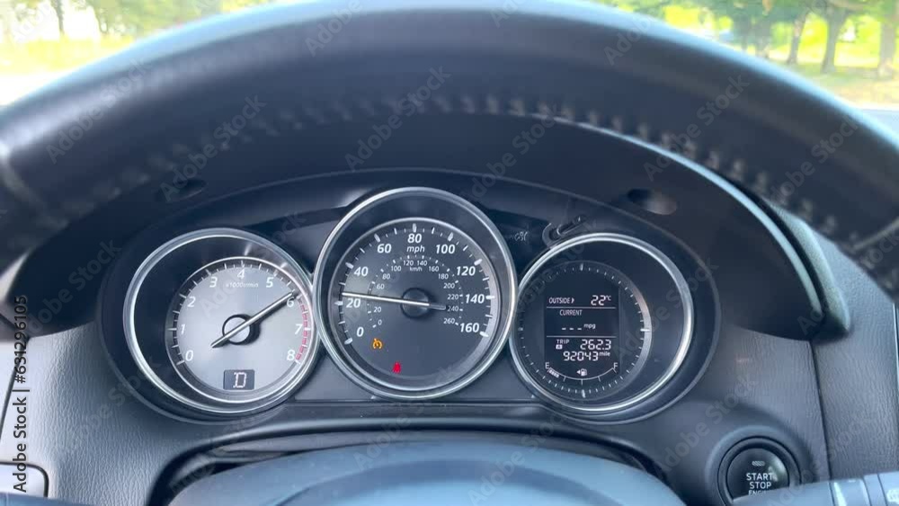Acceleration of the car. Instrument panel in a car. Speedometer and traffic Acceleration of the car. Instrument panel in a car. Speedometer and traffic