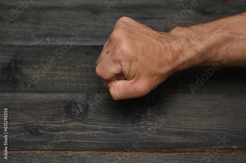 Canvas Print The man's palm is clenched into a fist.