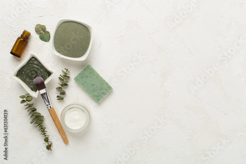 Composition with cosmetic clay and spa products on concrete background, top view © Liami