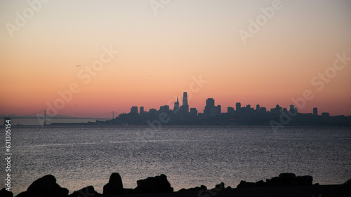 skyline of san francisco california during sunrise, taken across the bay in sausalito