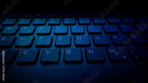 Close up of an illuminated notebook keyboard.