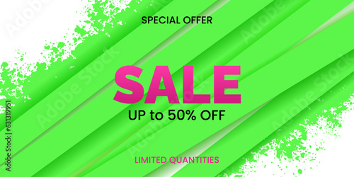 Sale banner with stripes and green ink splashes.