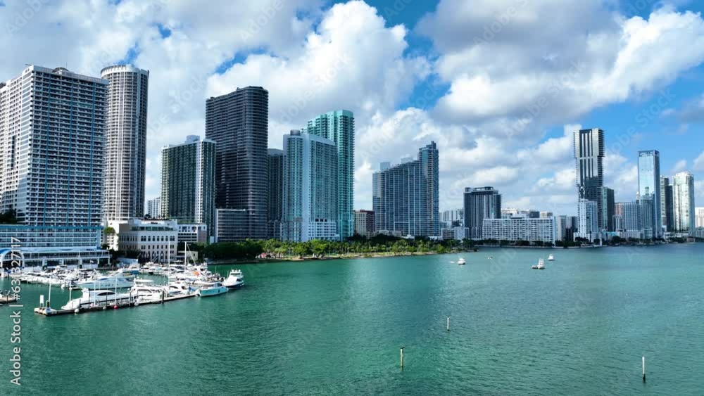 Aerial shot of the tall buildings along the ocean in downtown Miami Florida Aerial shot of the tall buildings along the ocean in downtown Miami Florida