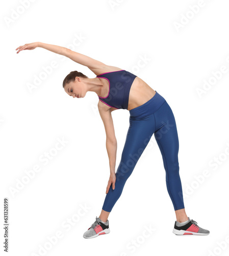 Yoga workout. Young woman stretching on white background
