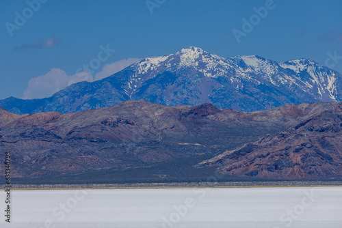 Landscape of the Bonneville Salt Flats in eastern Utah with Silver Island Mountain Range in the background
 photo