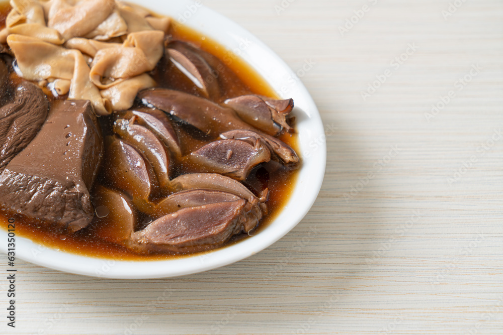 stewed duck offal in brown soup stewed duck offal in brown soup