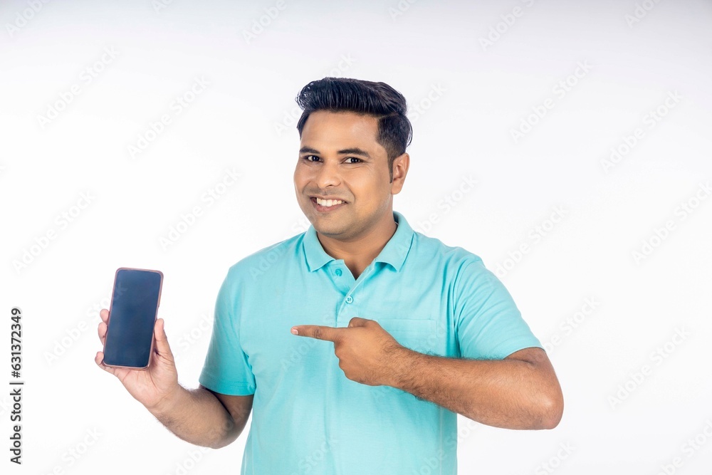 Indian man showing smartphone screen. Indian man showing smartphone screen.