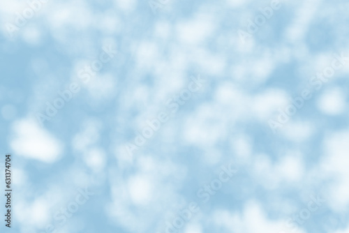 Light blue blurred bokeh abstract for background.