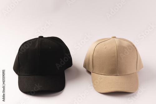 Cream and black baseball cap and copy space on white background
