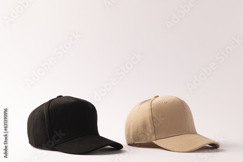 Cream and black baseball cap and copy space on white background
