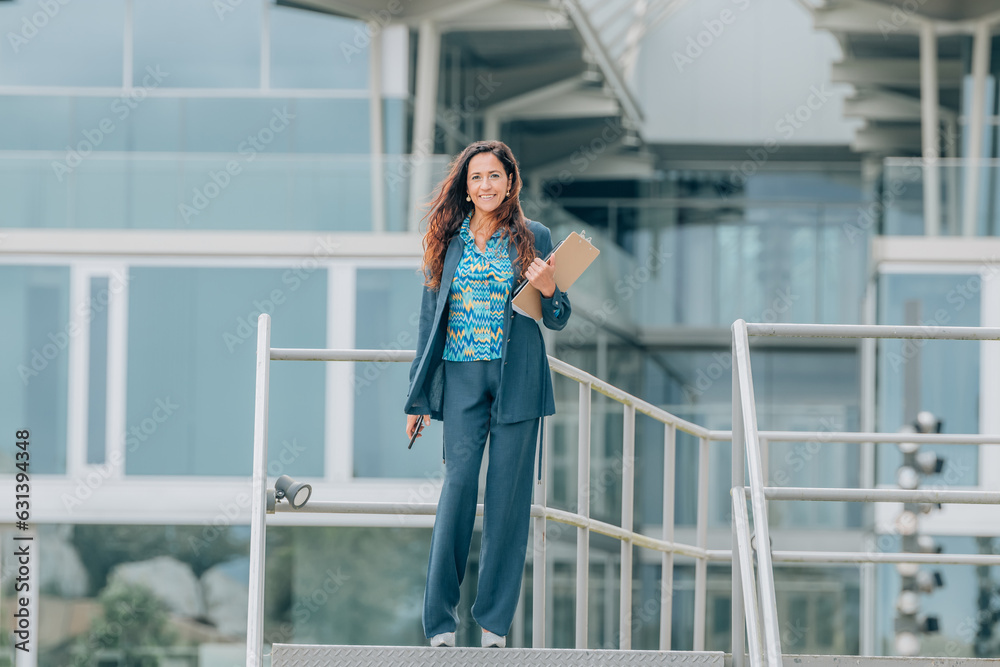 Fototapeta premium business woman on office stairs