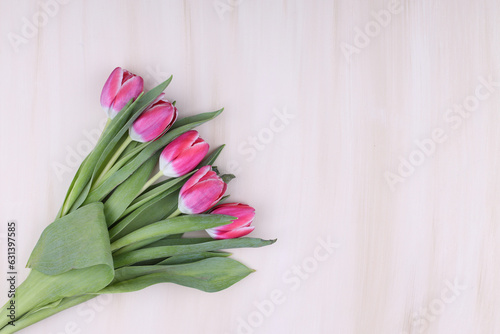  Bouquet of pink tulips. Mothers day, Valentines Day, Birthday celebration concept. Greeting card. Copy space for text, top view