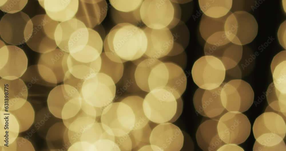 Video of flickering yellow bokeh spots of light with copy space Video of flickering yellow bokeh spots of light with copy space