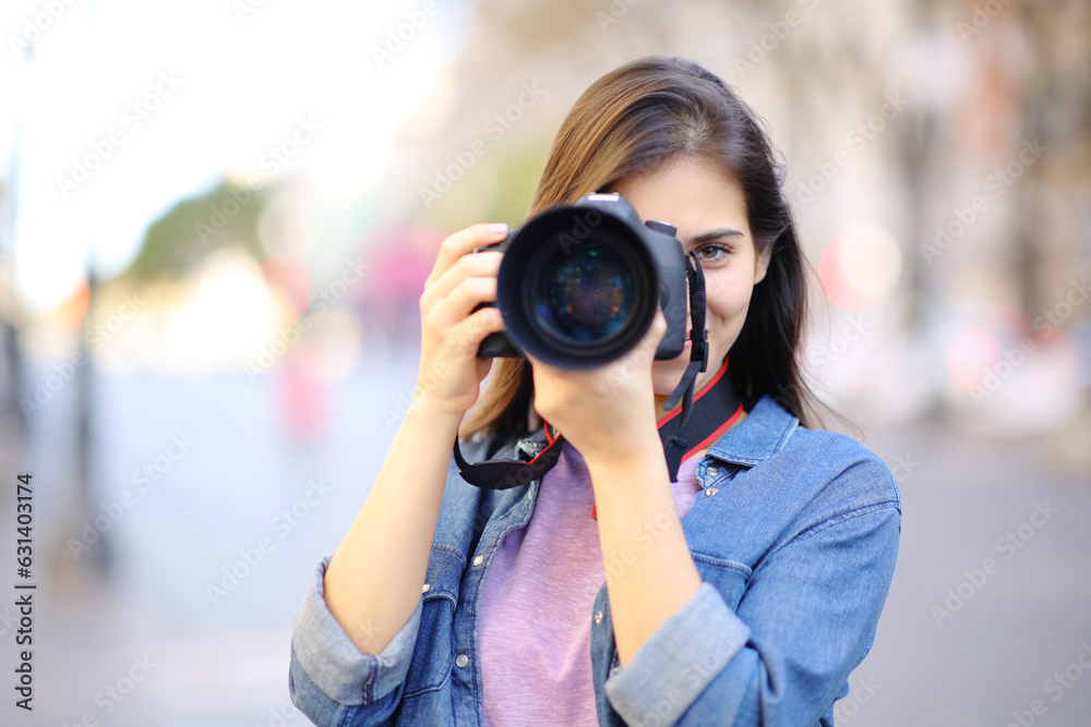 Photographer taking photos of you in the street
