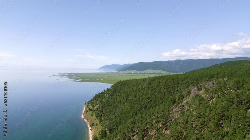 Beautiful scenic views of summer Lake Baikal from a bird's-eye view. Wildlife of the lake and rocks on a sunny day Beautiful scenic views of summer Lake Baikal from a bird's-eye view. Wildlife of the lake and rocks on a sunny day