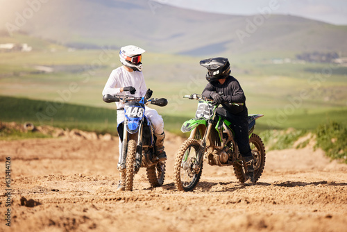 Friends, sports and men with motorcycle in countryside for fun, hobby and Moto stunt training, practice or freedom. Off road, motorbike and biker people in nature for adrenaline, challenge or race