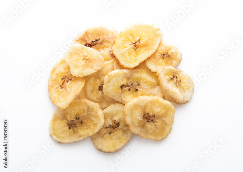 Dried dehydrated banana chips isolated on white background.Macro