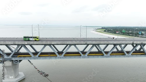 Aerial view of Padma bridge, over the Padma river by day in perspective, munsiganj, Dhaka, Bangladesh. photo